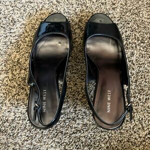 Nine West opened toe sling back black heels. Medium/high heel. 7.5.